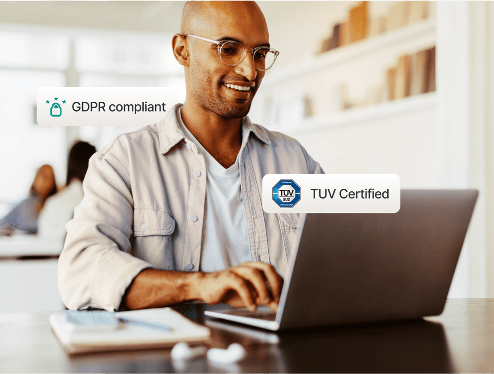 University staff using Studo GDPR compliant solutions with TÜV SÜD certification on computer