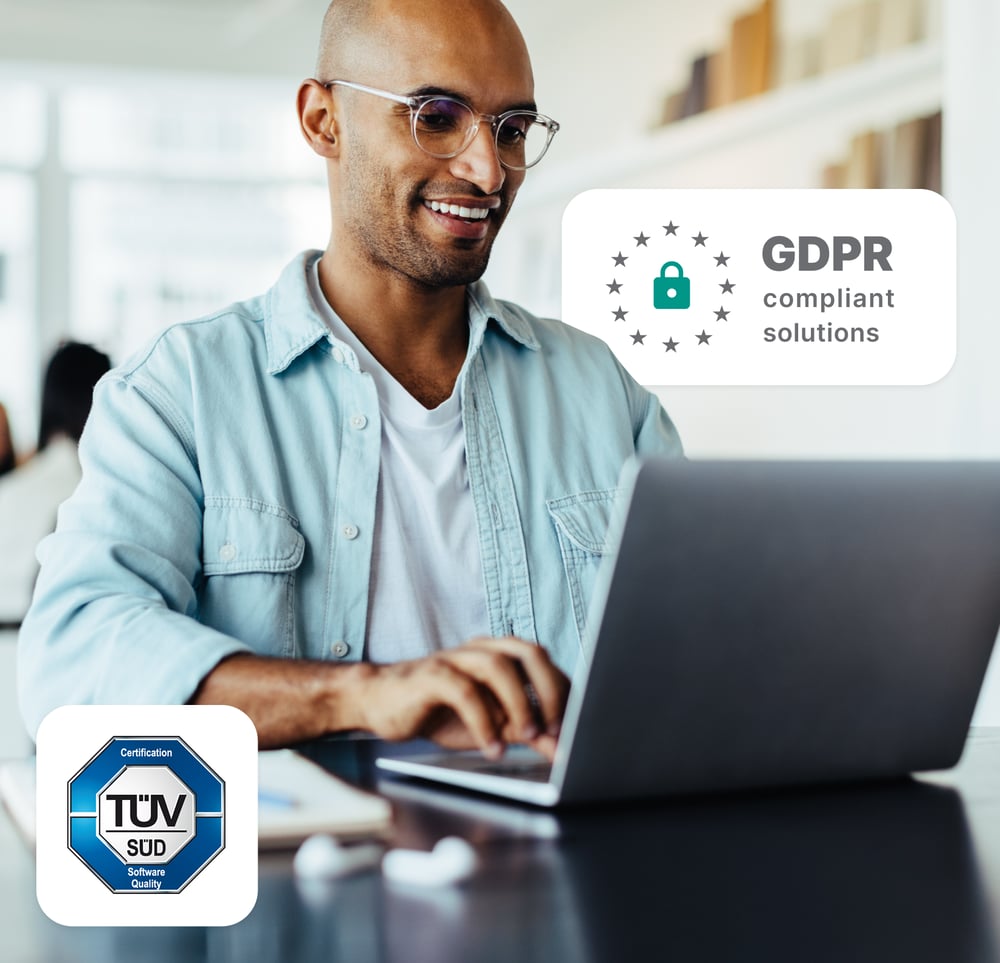 University staff using Studo GDPR compliant solutions with TÜV SÜD certification on computer