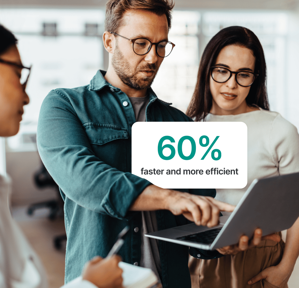 University staff collaborating on a laptop to demonstrate faster and more efficient processes with Studo digital ID cards